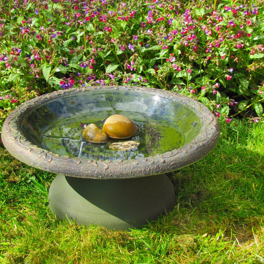 Coniston Bird Bath on lawn
